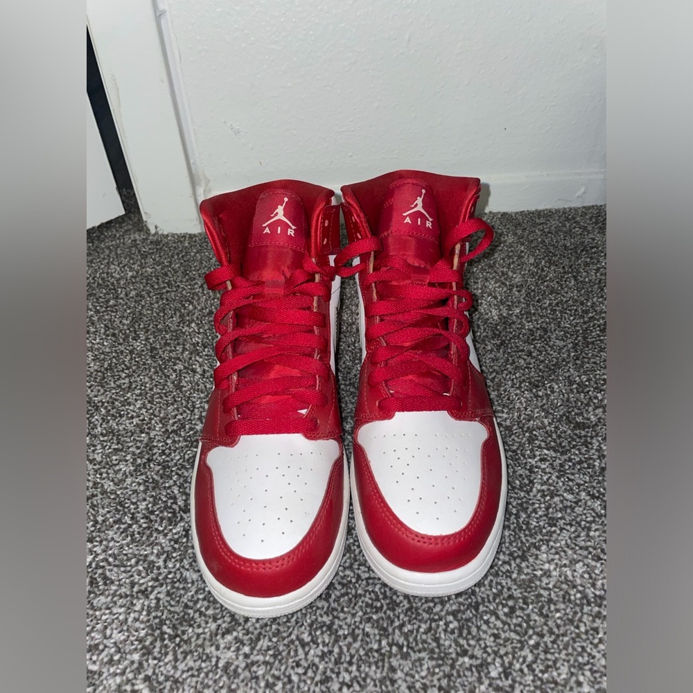 Red and white Jordan 1s
